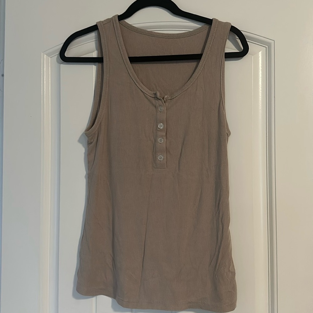 Tan tank with buttons
